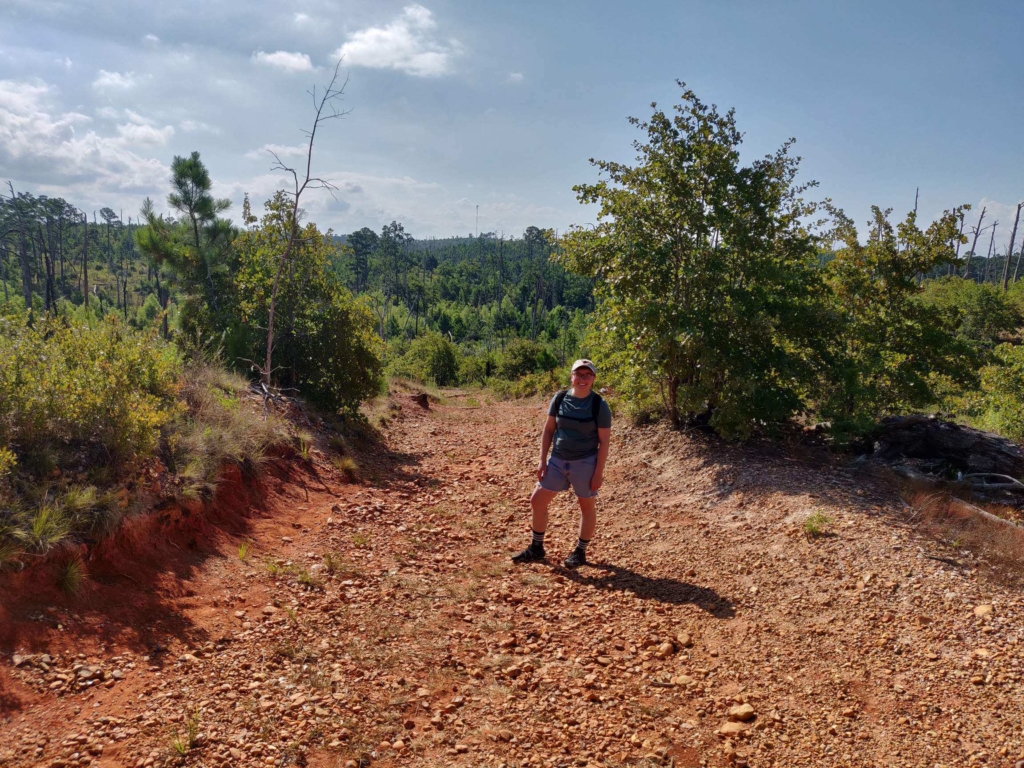 Paislee House, ShipEngine API Support Specialist, enjoying hiking outdoors.